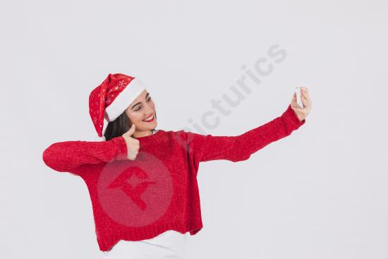 Festive Woman Taking Selfie