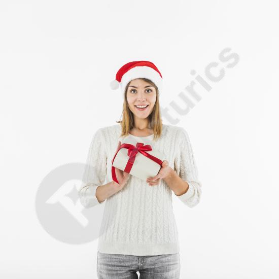 Happy woman standing with a gift box, ideal for holiday, celebration, and festive-themed designs.