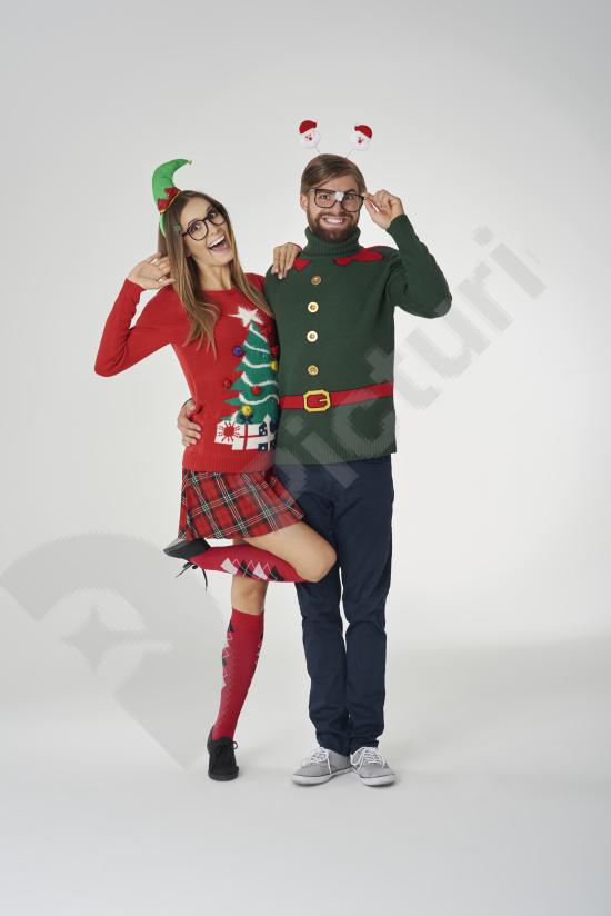 Romantic couple wearing Christmas outfits, perfect for holiday promotions, seasonal marketing, festive ads, and winter-themed designs.