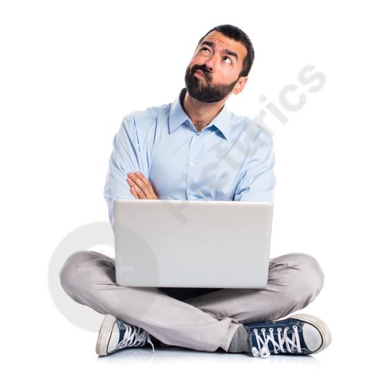 Man with a laptop having doubts, expressing uncertainty, decision making, problem solving, and modern digital work challenges.