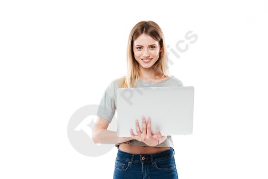 Woman using a laptop computer, representing remote work, business, productivity, and modern digital lifestyle.