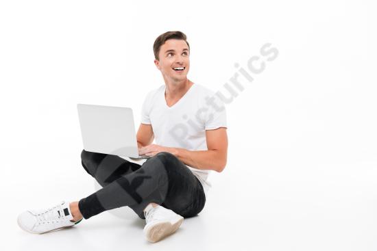 Portrait of a positive smiling man working, representing confidence, productivity, success, and a modern professional lifestyle.