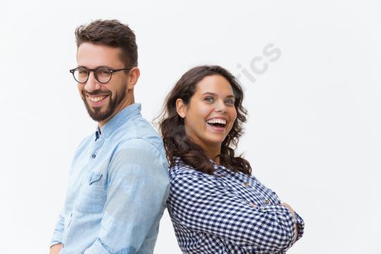 Happy cheerful couple leaning on each other, expressing love, connection, happiness, and positive relationship lifestyle moments.