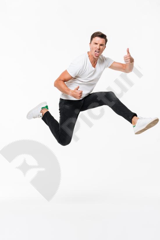 Portrait of a joyful and positive man smiling with a friendly expression, ideal for marketing, lifestyle content, and promotional designs.