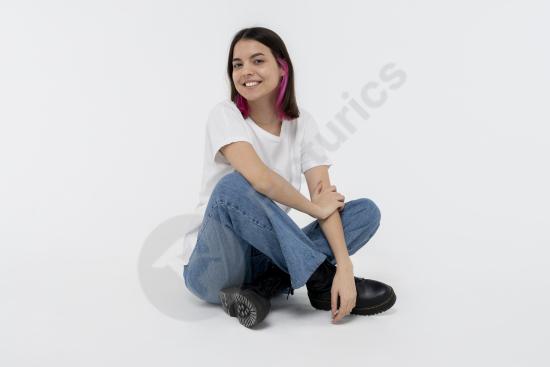 Portrait of a smiling teen girl with a natural and positive expression, suitable for youth, education, lifestyle, or modern design concepts.