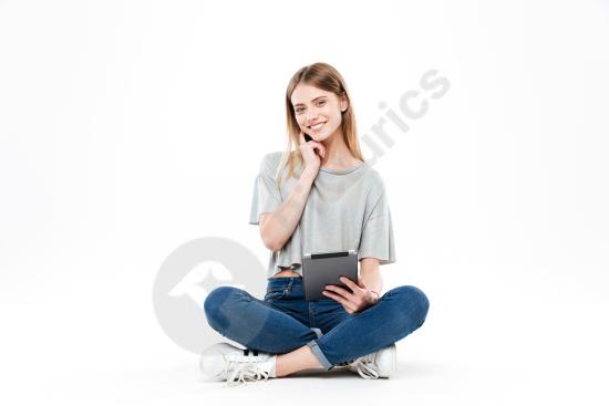 Young woman posing with a tablet, isolated on a clean background, ideal for technology, app mockups, presentations, and digital concepts.