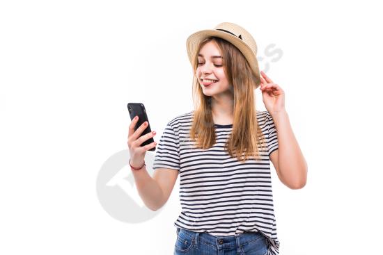 Young woman wearing a straw hat and sunglasses while making a video call, representing modern communication, summer lifestyle, and social connection.