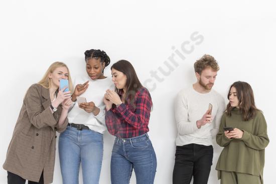 Group of friends using mobile phones together, representing social connection, technology, communication, and modern lifestyle concepts.