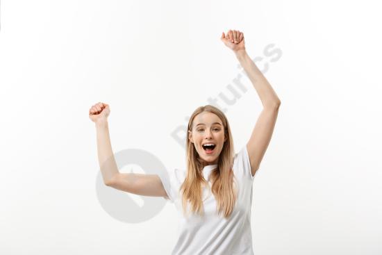 Beautiful happy woman celebrating with a joyful expression, representing success, positivity, happiness, and uplifting lifestyle concepts.