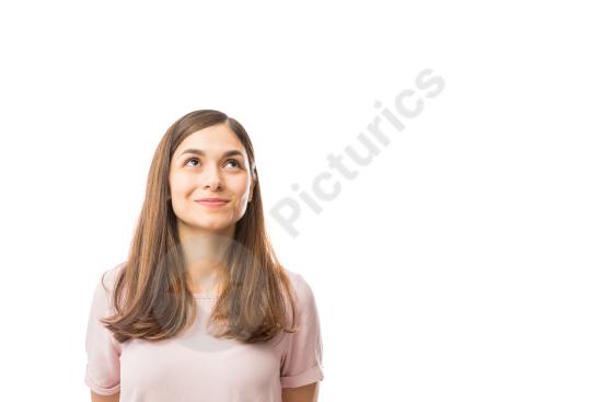 Pretty woman smiling while looking up at blank space. Clean studio portrait perfect for advertising, copy space, and creative concept design.